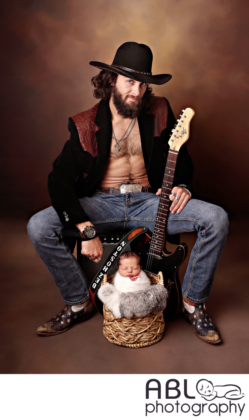 Country dad with guitar and son