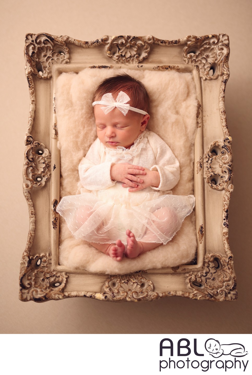 Carmel Valley newborn photographer, baby in picture box