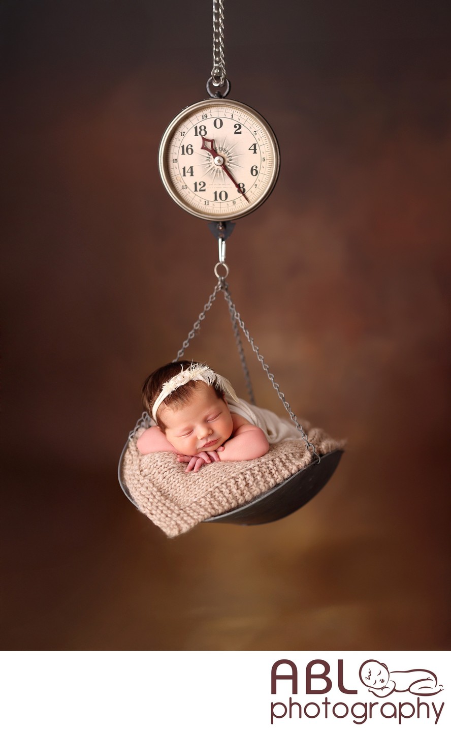 Fine art newborn photography San Diego, baby on scale