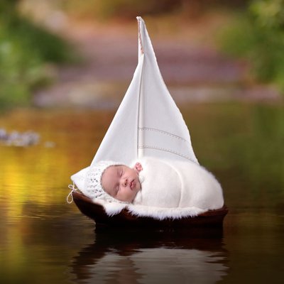 Baby in boat photo shoot San Diego newborn photographer