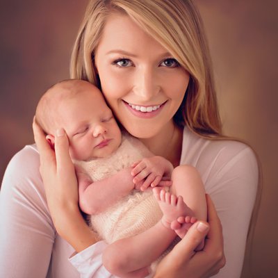 San Diego newborn photography with mom holding newborn