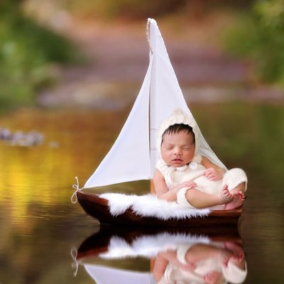 San Diego outdoor newborn photography, baby sailing