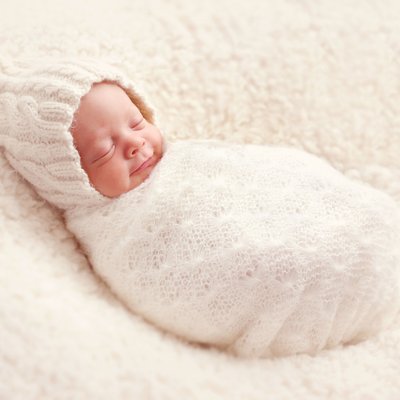 Mira Mesa newborn photo shoot, cute baby boy smiling