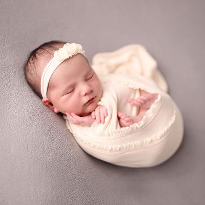 baby wrapped on gray, newborn photographer Chula Vista