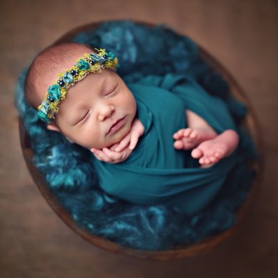 Newborn photographer, baby in teal