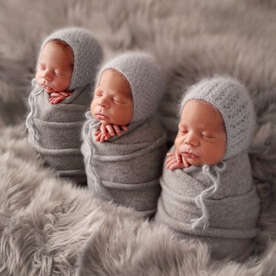 Triplet newborn photography posing idea in San Diego CA