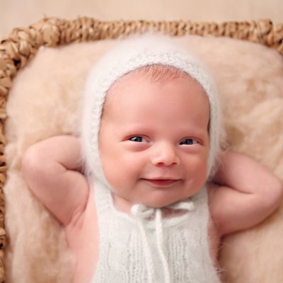 Carlsbad, CA newborn photographer, smiling newborn baby