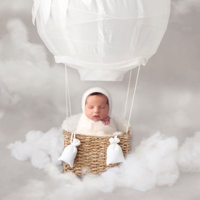 Baby on hot air balloon. 