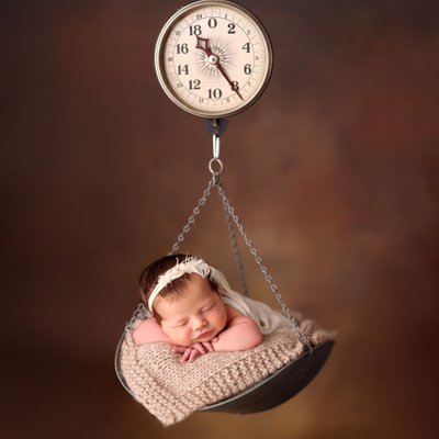 Fine art newborn photography San Diego, baby on scale