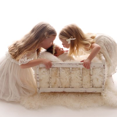 San Diego newborn photographers sibling love