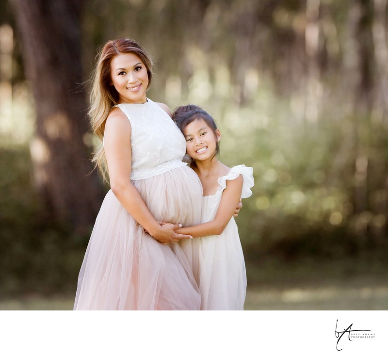 Mother and daughter maternity photo