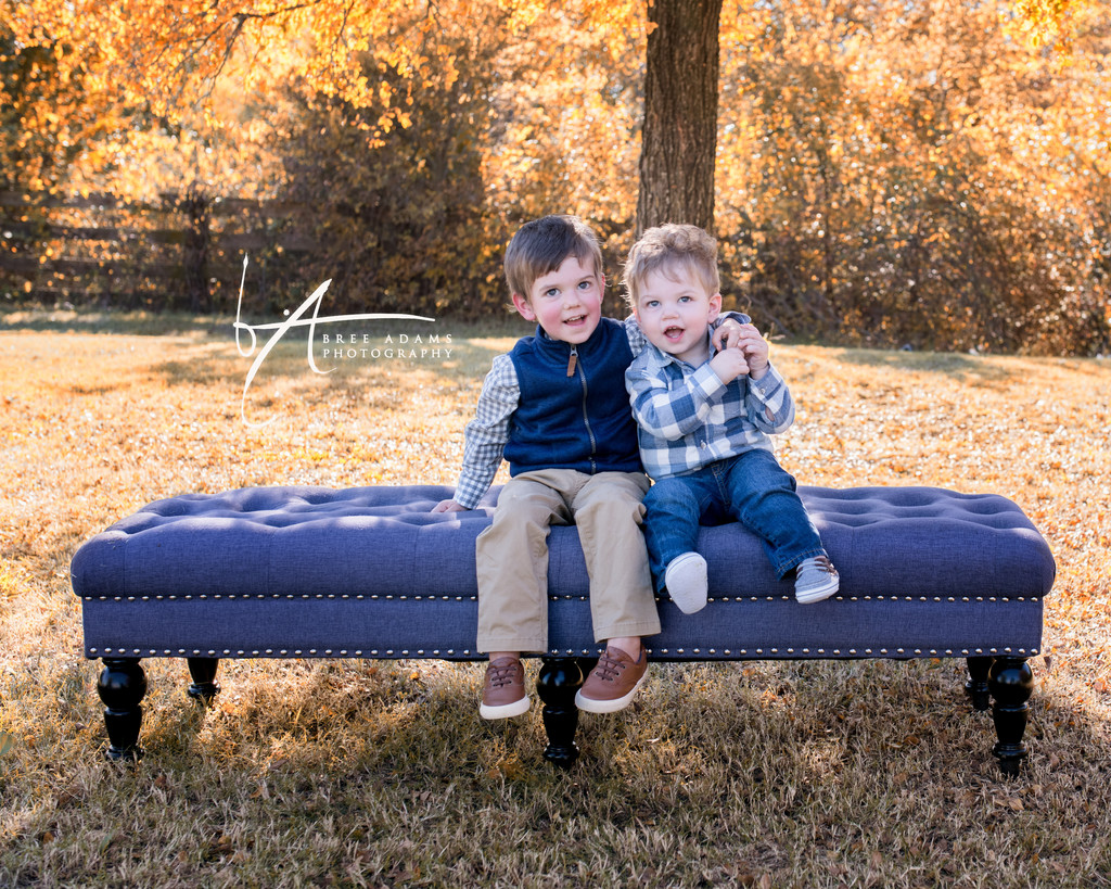 photo of brothers on a bench outdoors