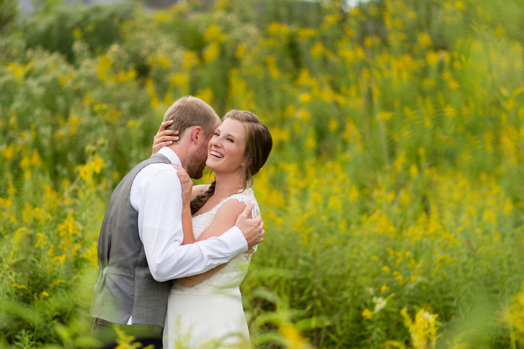 Riveredge Nature Center Wedding couple in flower field