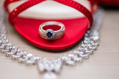 Wedding rings in a red shoe