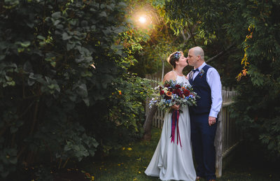 A wedding kiss in a secret garden