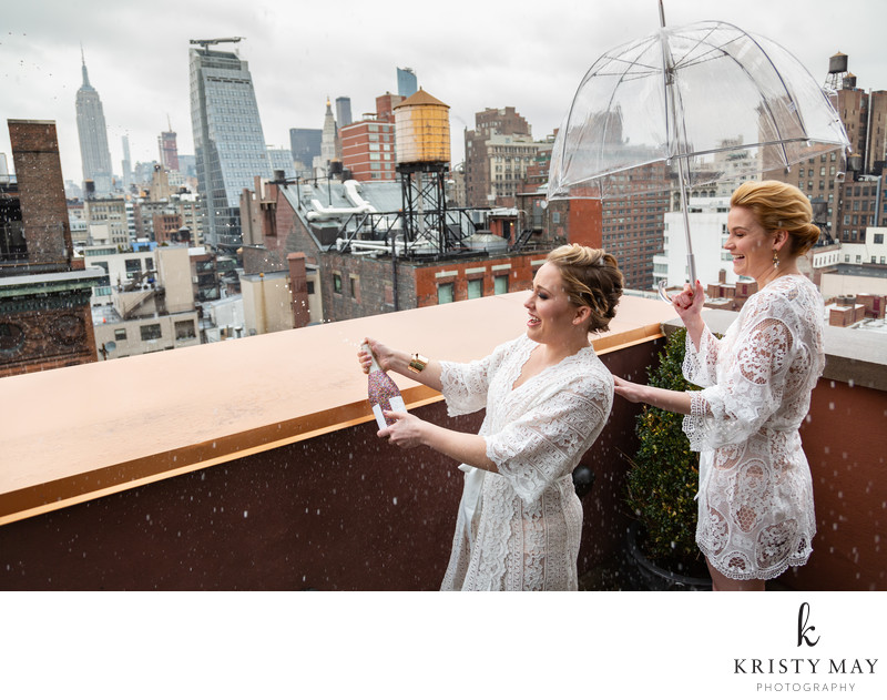 Brides pop champagne on NYC rooftop to celebrate Brides pop champagne on NYC rooftop to celebrate