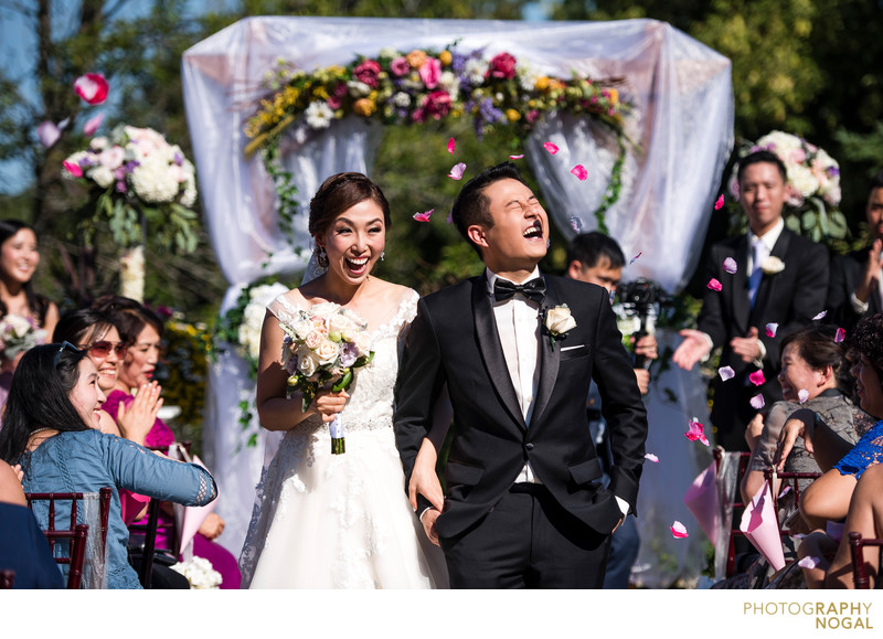 Groom Getting His In The Face With Flower Petals