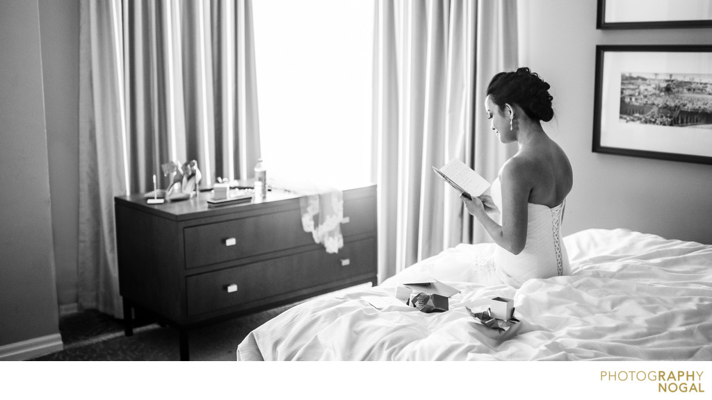 A bride reading a love letter from her future husband