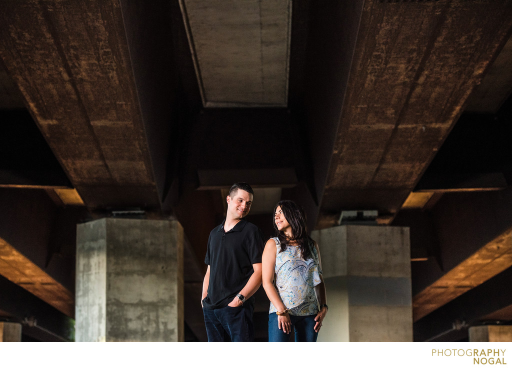 Toronto couple stands underneath Gardiner Expressway