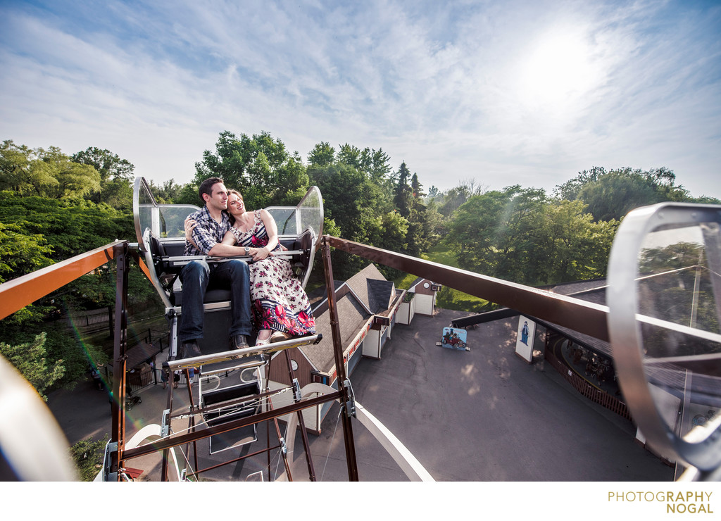 Couple on top of ferris wheel on Toronto Island.