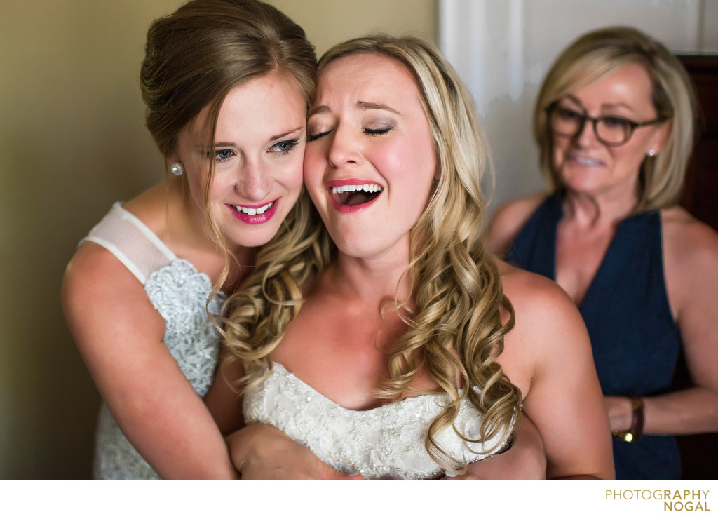 Bride Crying After Hugging With Bridesmaid