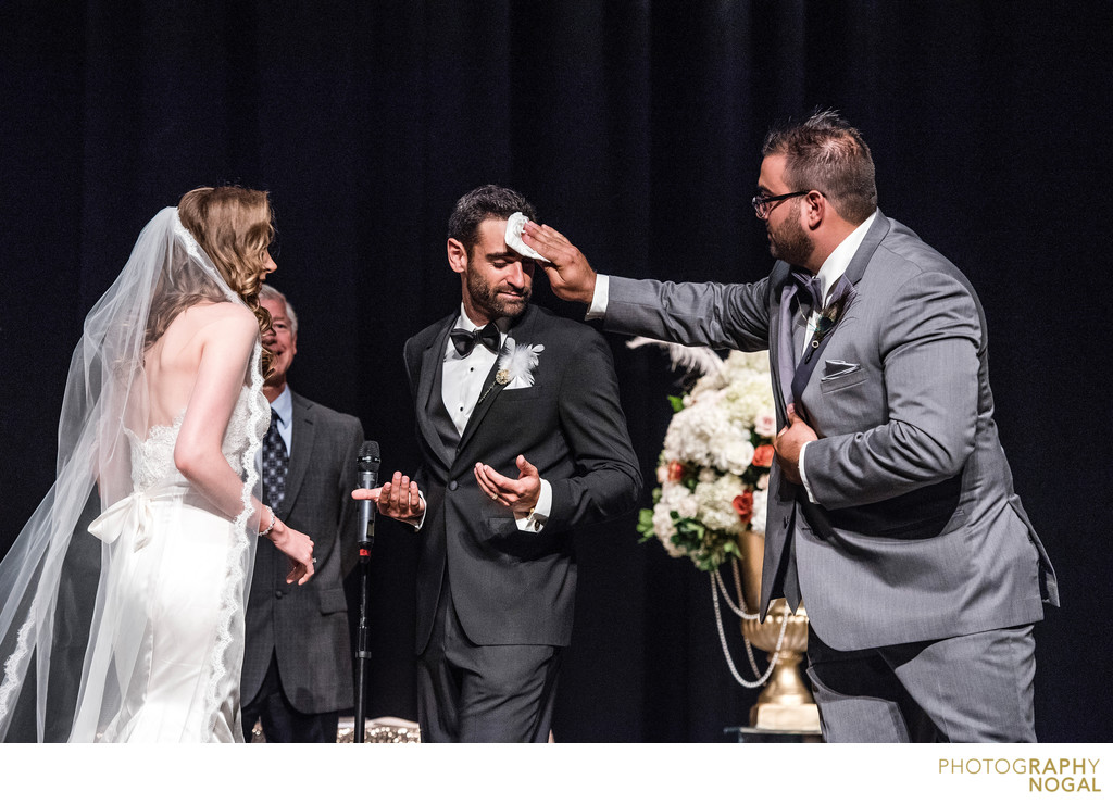 Wiping Sweat for Groom's Forehead