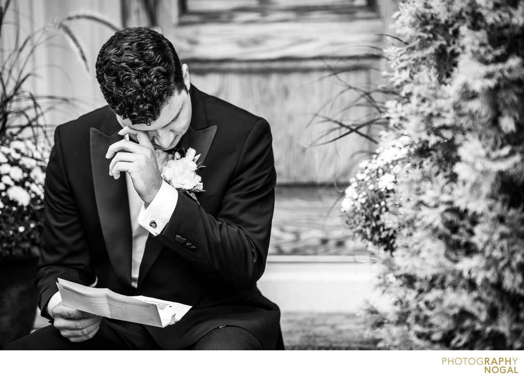 Groom Wiping Tears Away After Reading Letter From Bride