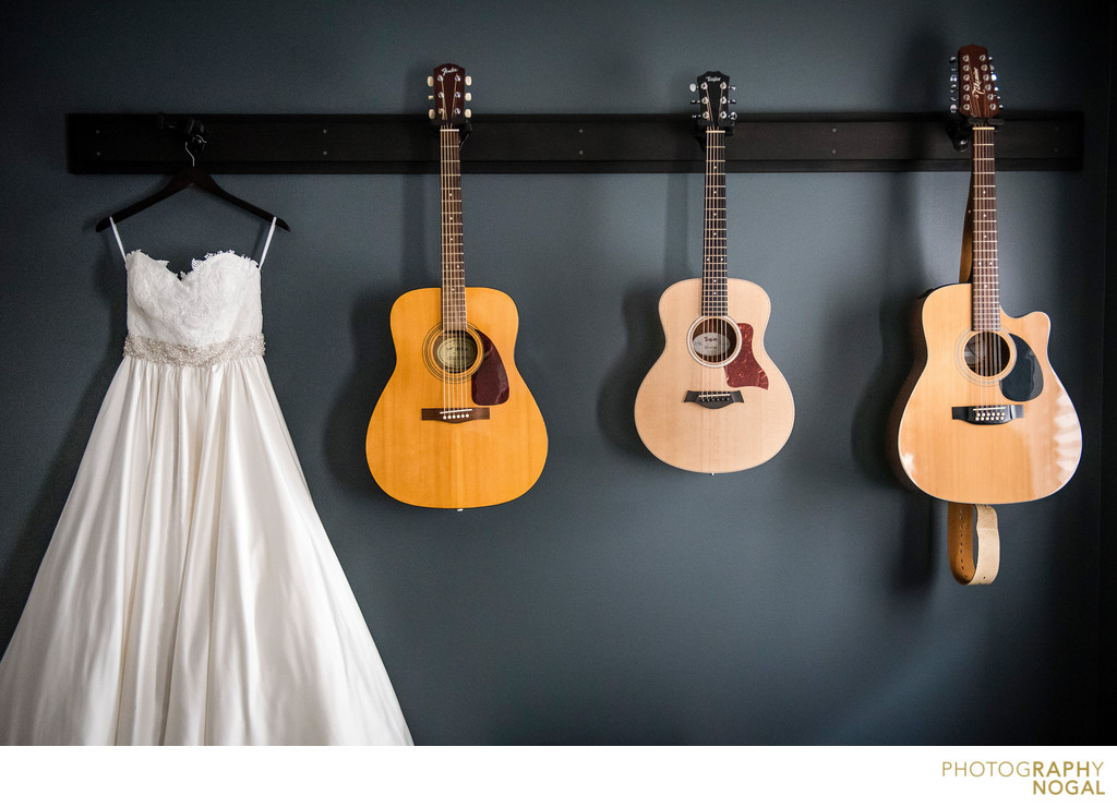 Wedding Dress Hanging With Guitars