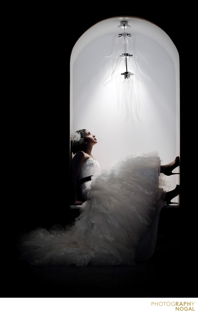 Bride with High Heels in Alcove of Novotel Hotel