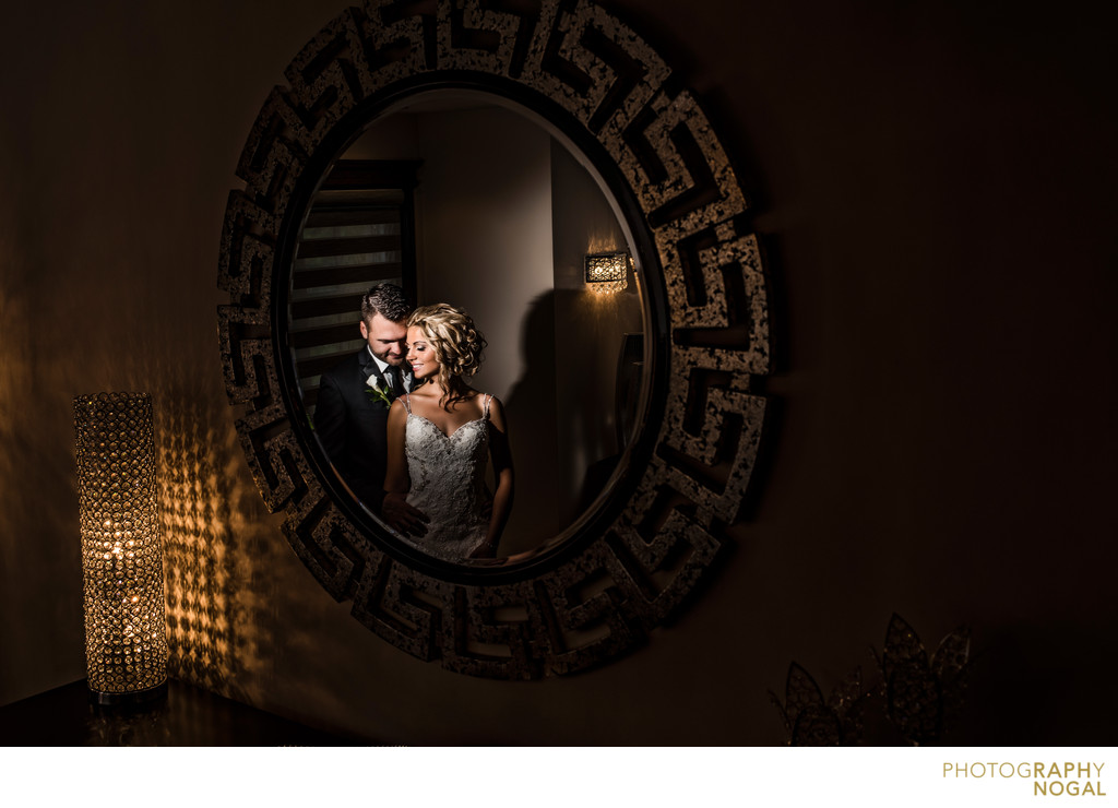 Couple Reflection in the Mirror on Wedding Day