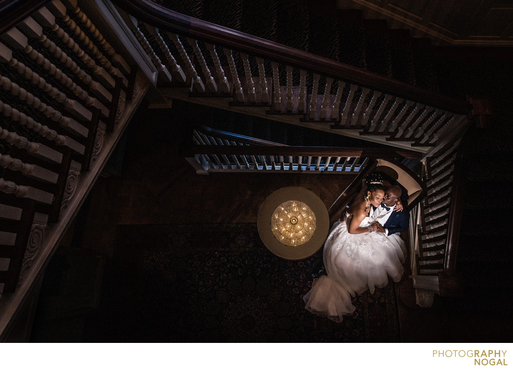 Couple at Bottom of the Stairs at Graydon Hall Manor