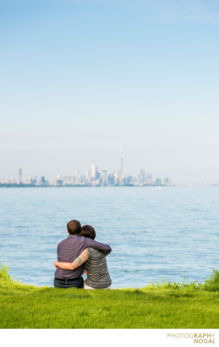 Toronto couple gazing upon downtown and CN tower