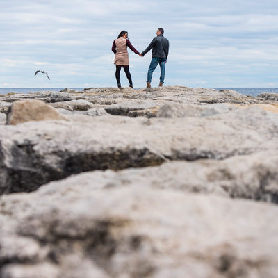 Couple holds hands, Sam Smith Park, Humber College