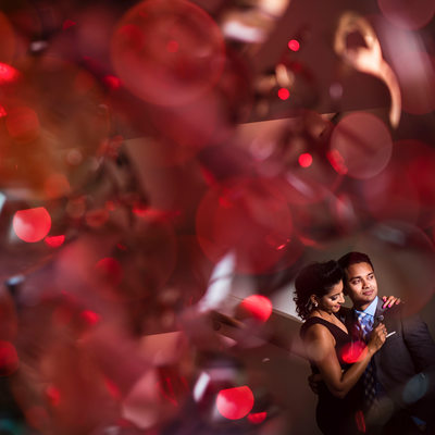 Photograph shot through a light fixture with a red gel.