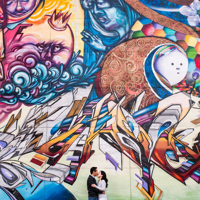 The Esplanade, graffiti wall, kissing couple