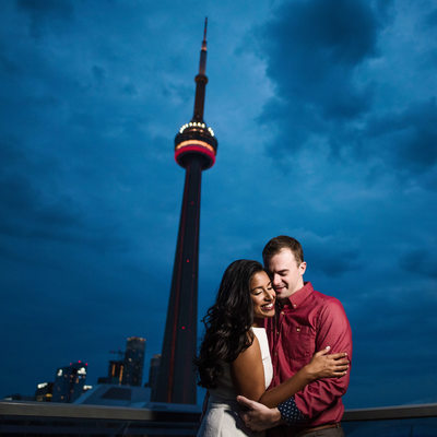 Embrace On A Rooftop by the CN Tower