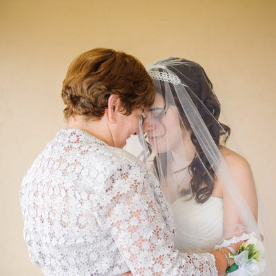 Bride and Mom Touching Foreheads in Silent Moment