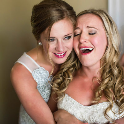 Bride Crying After Hugging With Bridesmaid