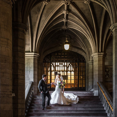 Bride and Groom Walking Down Stairs at Knox Collage
