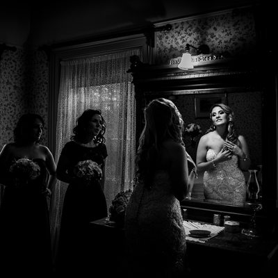 Bride Looking in the Mirror at Benares Historic House