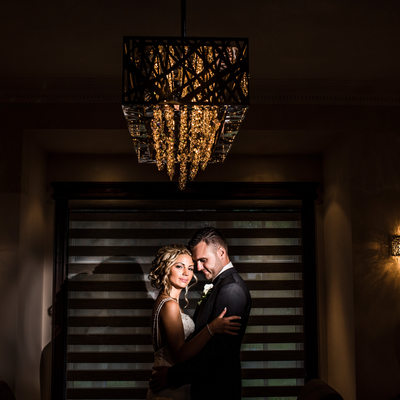 Bride and Groom in the Livingroom with Dramatic Light