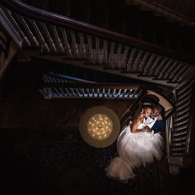 Couple at Bottom of the Stairs at Graydon Hall Manor
