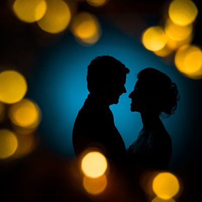 Bride and Groom Silhouette with Bokeh Balls