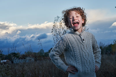 A boy in the park during sunset