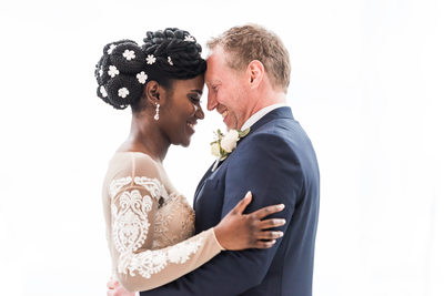 Bride and Groom At The Ceremony After Their First Kiss