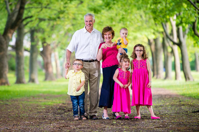 grandparents with grandkids in the park