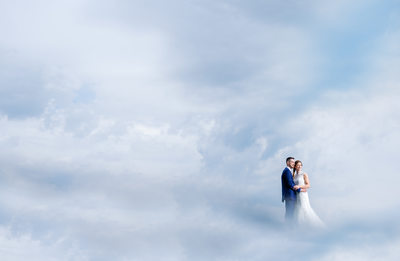 Bride and Groom in the clouds