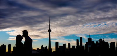 Engagement photos in Toronto featuring skyline