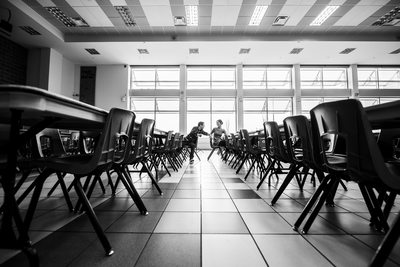 Highschool Sweethearts Chatting in the Cafeteria.