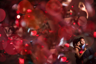 Photograph shot through a light fixture with a red gel.